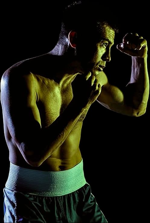 Athlete in boxing gloves, the energy the FitPlus brand is built around